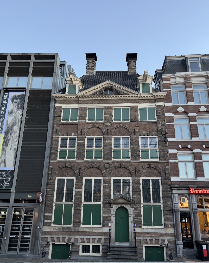 The Rembrandt House Museum in Amsterdam, showcasing the exterior of the historic building where the famous Dutch artist Rembrandt van Rijn lived and worked.